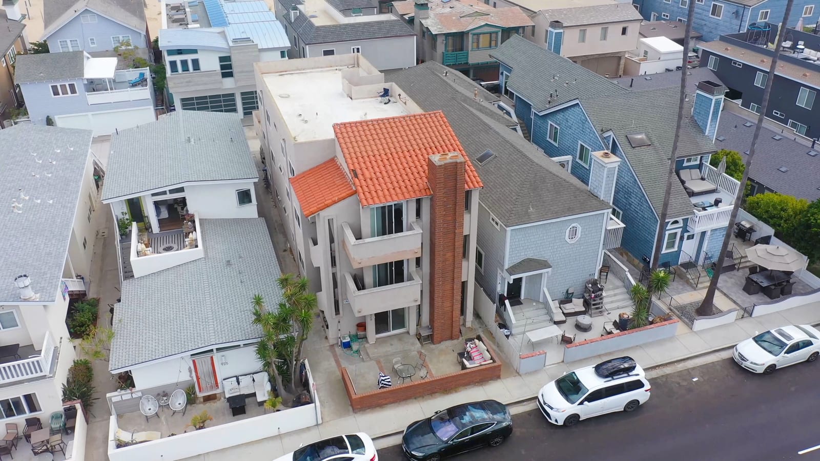Aerial of a Peninsula triplex used as marketing imagery for 929 W Balboa Blvd